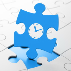 Timeline concept: Clock on puzzle background
