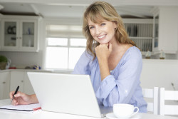 Midlife woman working from home