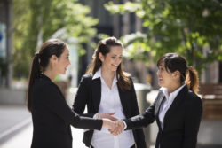 caucasian business women shaking hands. business concept.